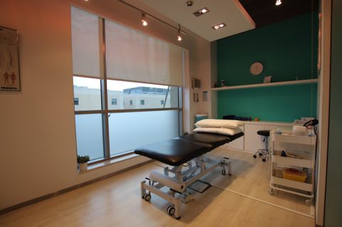 Private treatment room with therapy table